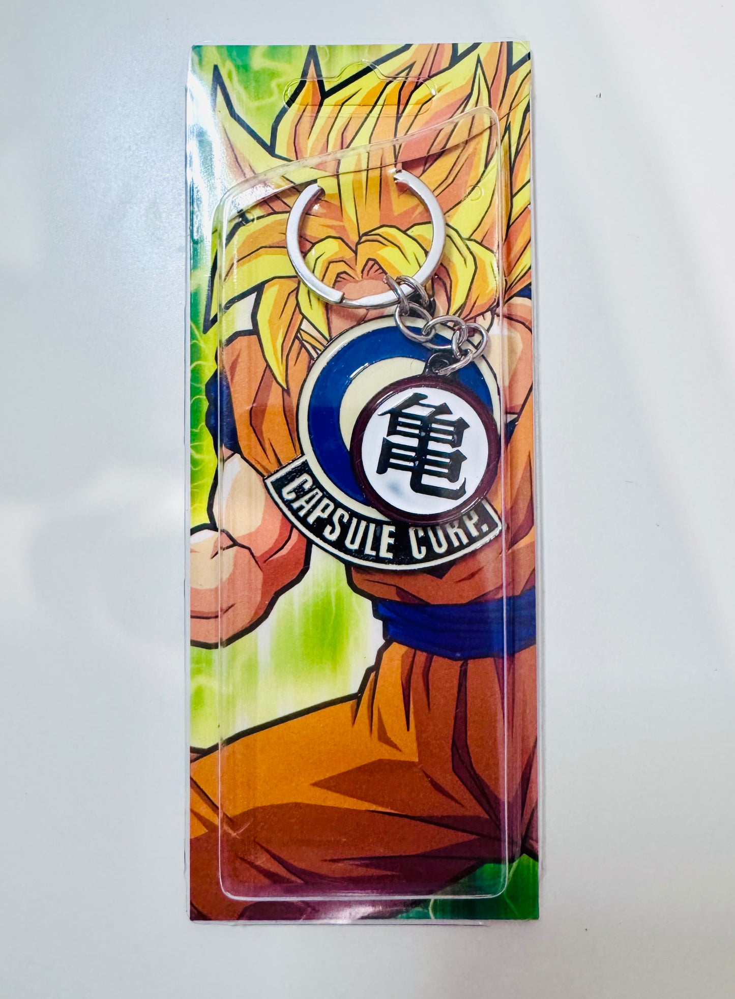 Dragon Ball Z Keychain - Gi Kanji and Capsule Corp Symbol Logo